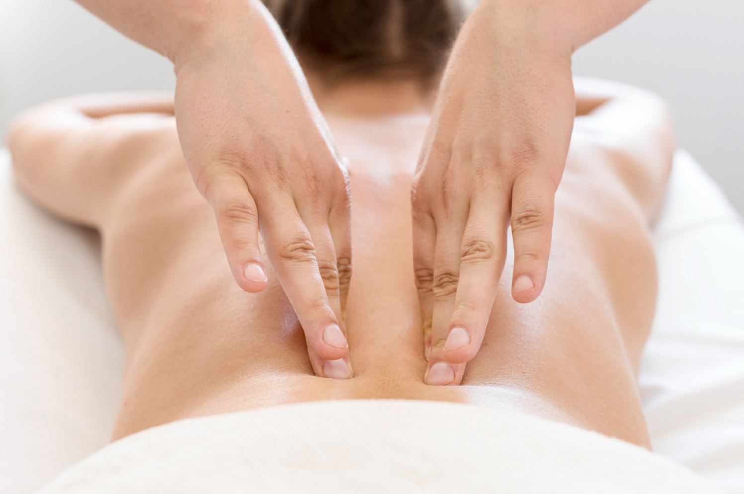 Therapist working on a guest's upper back — Couples Massage at Blue Bay SPA Winter Park